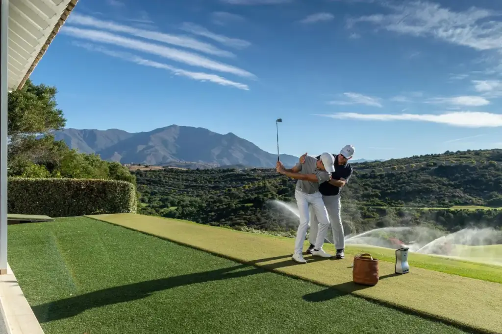 Golf coach with student on a golf course in Spain